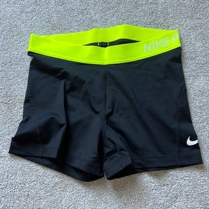 NWOT Nike Pros with a Neon Band